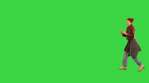 Rocker Girl Walking and Making Dancing Moves on a Green Screen Chroma Key