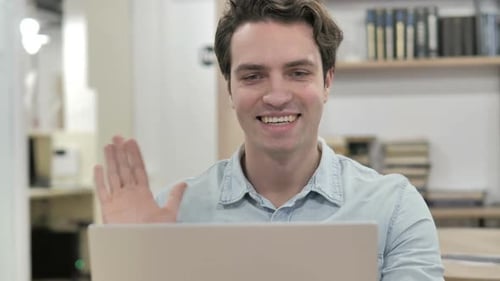 Cheerful Young Adult Having a Video Call