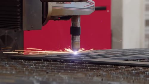 Robotic Laser Cutter Precisely Incising Metal Sheet