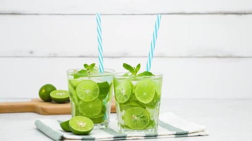 Refreshing Lime and Mint Drinks with Straws