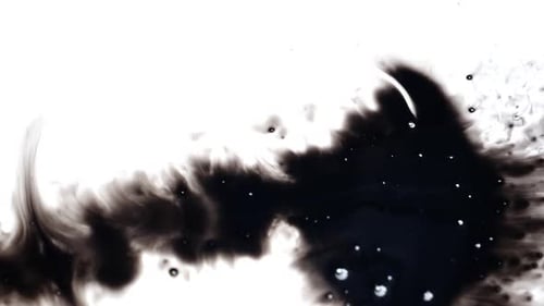 Black Ink Spreading on White Background