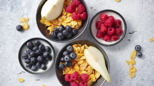 Breakfast Bowls with Cornflakes, Fruit, and Berries