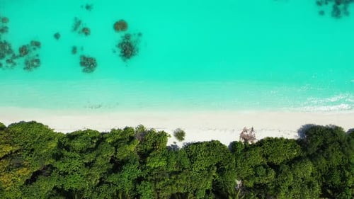 Wide angle aerial abstract view of a white sandy paradise beach and aqua blue water background in 4K