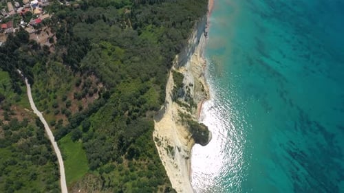 Sheer White Cliffs Of Cape Drastis Near Peroulades 10