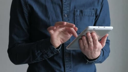 businessman using digital tablet