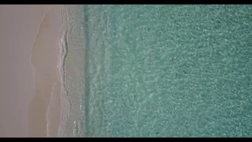 Aerial nature of tropical tourist beach voyage by aqua blue water and white sandy background of a da