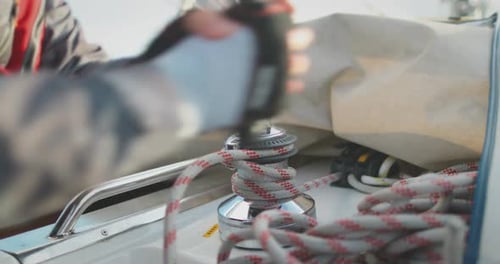 Sailboat Winch Operated on a Sunny Day