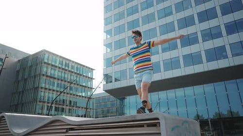 Flexible and cool businessman doing acrobatic tricks outdoor.
