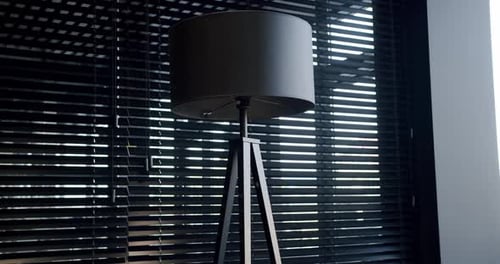Modern Lamp with Tripod Base Near Window