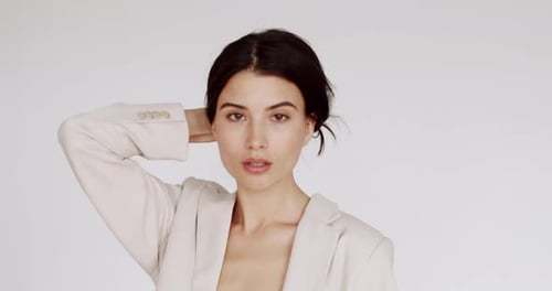 Stylish Woman Poses in Light Beige Blazer