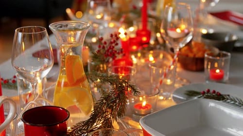 Festive Table Setting With Candles and Sparkling Lights