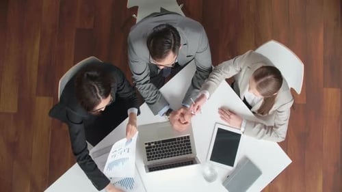 Business Team Analyzing Statistics