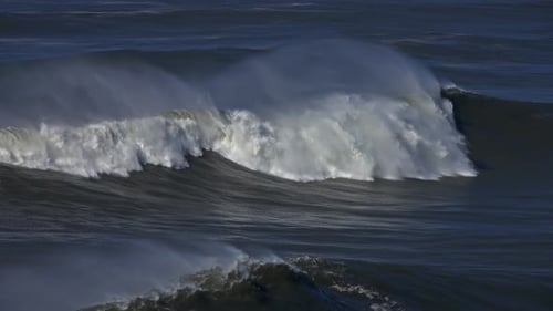 Large Waves Rolling on Surface of Stormy Ocean