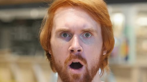 Surprised Young Adult Man Close Up Face