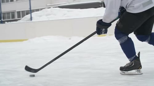 Hockey Player Losing a Puck
