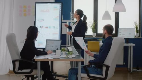 Business People Working on Project Strategy at Corporate Meeting