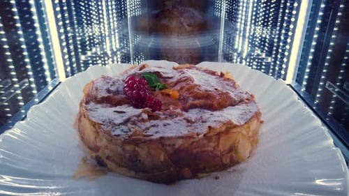 Assorted Dessert Cakes and Parfaits in Refrigerated Case