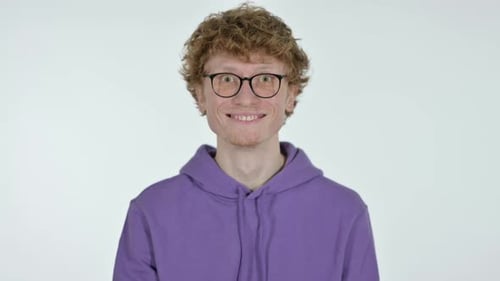 Yes Sign By Head Shake Redhead Young Man, White Background
