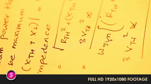 Close Up Of Equations on Paper