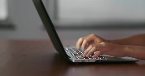 Type on laptop computer