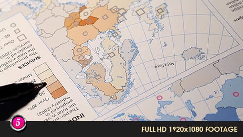 Close Up of Colorful Map with Pen