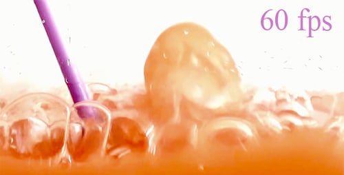 Drink Stirred with Straw with Ice Cubes