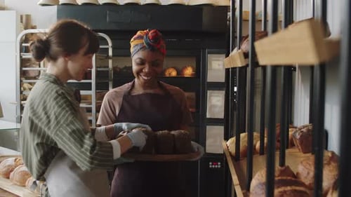 Diverse Female Colleagues Working Together in Bakery