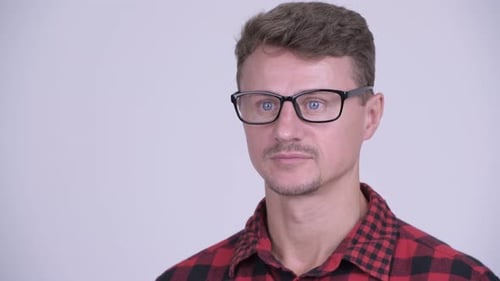 Smiling Man with Glasses and Red Flannel Shirt