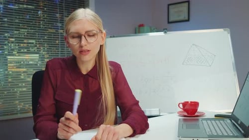 Young Woman Teaches Online Math Lesson