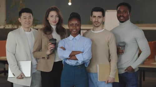 Portrait of Successful Business People Group Standing in Office Room Looking at Camera