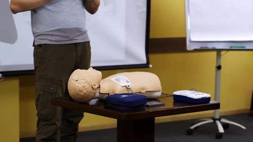 CPR Training with Dummy and Equipment