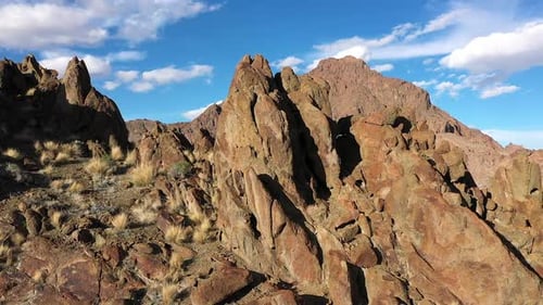 Panning aerial view of rocky desert landscape in Utah