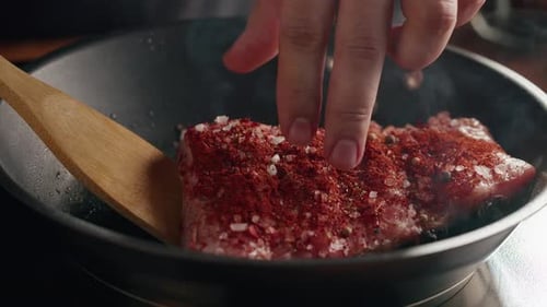 Chef Frying Ribs Closeup