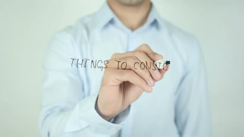 Writing Things to Consider on Clear Surface