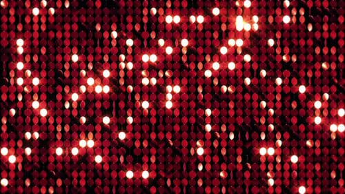 Fond réfléchissant à paillettes. Rouge et bleu. 2 vidéos dans 1 fichier. Bouclable.