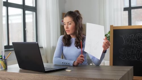 Woman Teaching Online Class from Home
