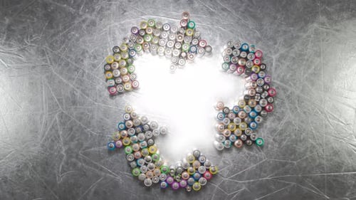 Batteries in Recycle Symbol on Brushed Metal Surface