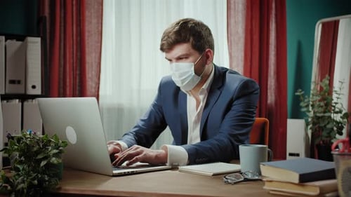 Executive Senior CEO Businessman in Medical Mask Working Online on Laptop Remote Office Man Typing