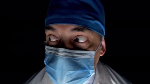 Intense Doctor Gaze During Late Night Shift