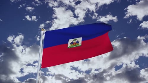 Haiti Flag Waving in Wind Against Cloudy Blue Sky
