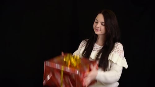 Young Woman with Birthday Gift Box