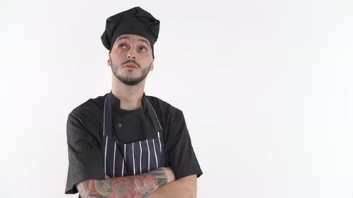 Uniforme de chef pensando no que cozinhar