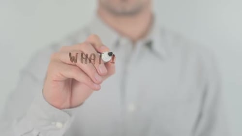 Man Writes "What is Content Marketing" on Glass