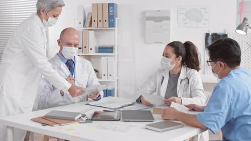 Medical Professionals Collaborate in Modern Healthcare Setting