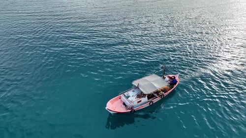Fishing boat goeas to sea aerial view Turkey Alanya 4 K