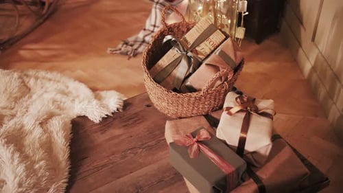 Presents in a Basket by a White Rug