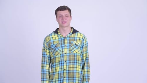 Young Adult Crying In Front of White Background