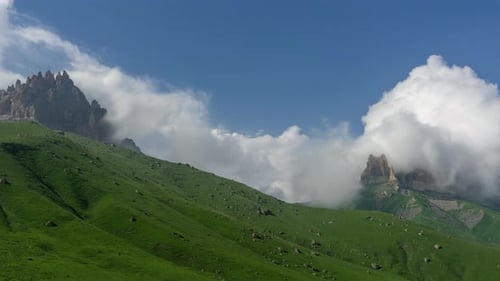 Mountain Landscape with Clouds and Greenery