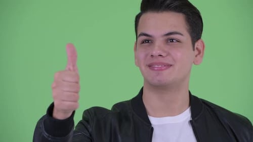 Young Adult Giving Thumbs Up on Green Screen