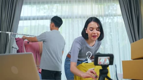 Woman Selling Clothes Online with Fashion Vlog